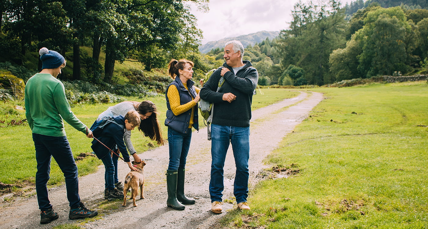 a family walking their dog